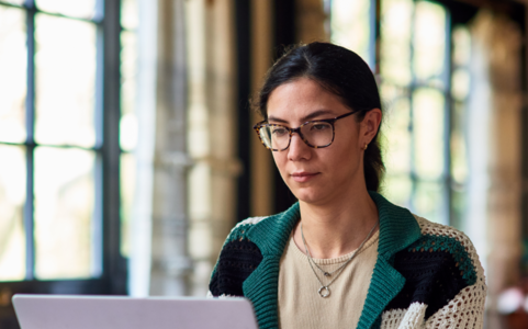Woman looking at a laptop
